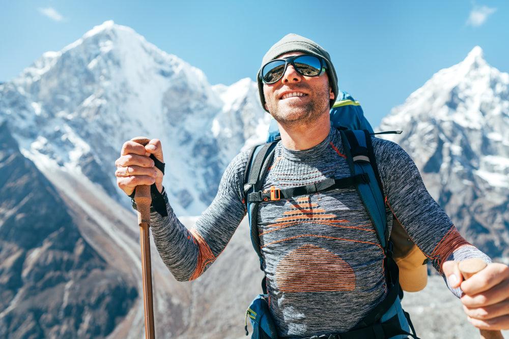 man wearing baselayer on sunny day