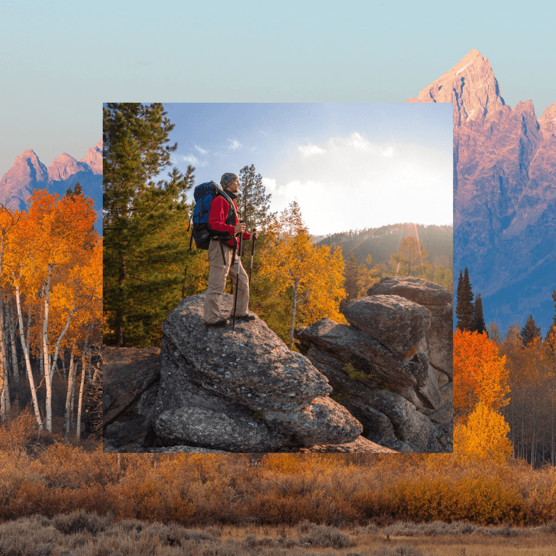 male backpacker during fall hike