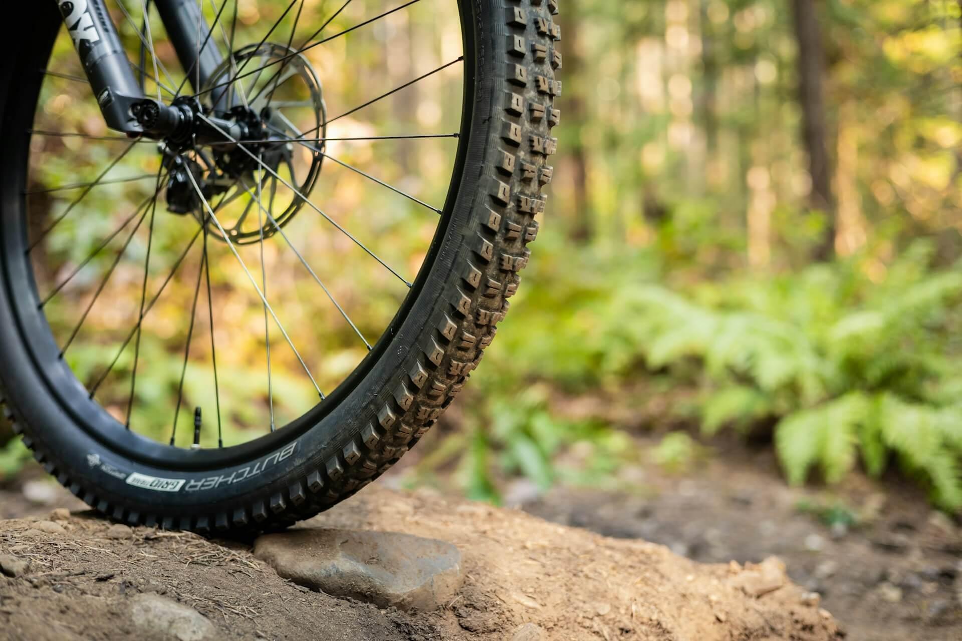 close-up of a mountain bike tire on a trail