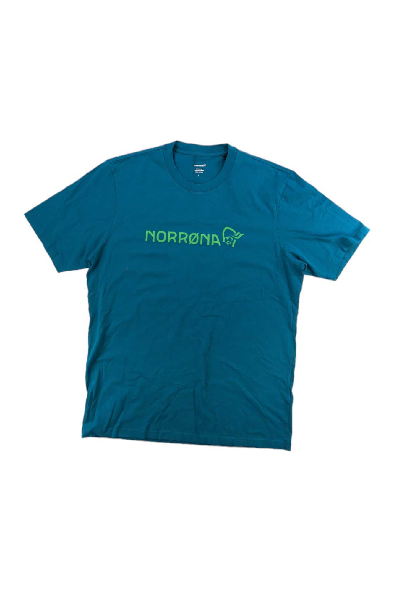 The Norrona Mens /29 Cotton Norrona Viking T-Shirt is a blue men's cotton tee featuring "NORRØNA" and a green logo on the chest, laid flat on a white background—ideal for outdoor adventure enthusiasts.