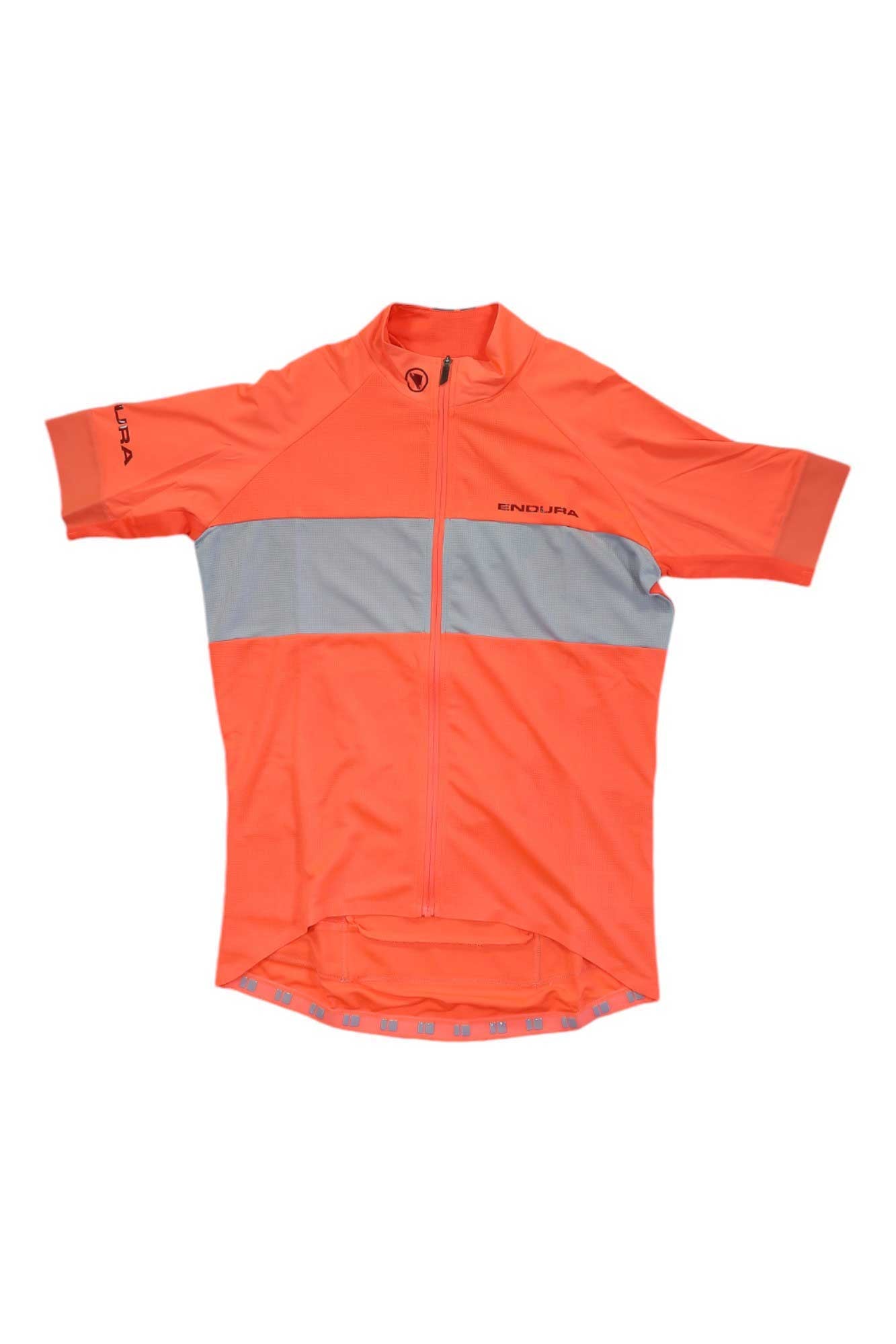 The Endura Womens FS260 Pro SS Jersey is a bright orange, slim-fit cycling top with a reflective gray stripe, front zipper, and Endura branding. Made from moisture-wicking fabric to keep you dry and comfortable on your ride.