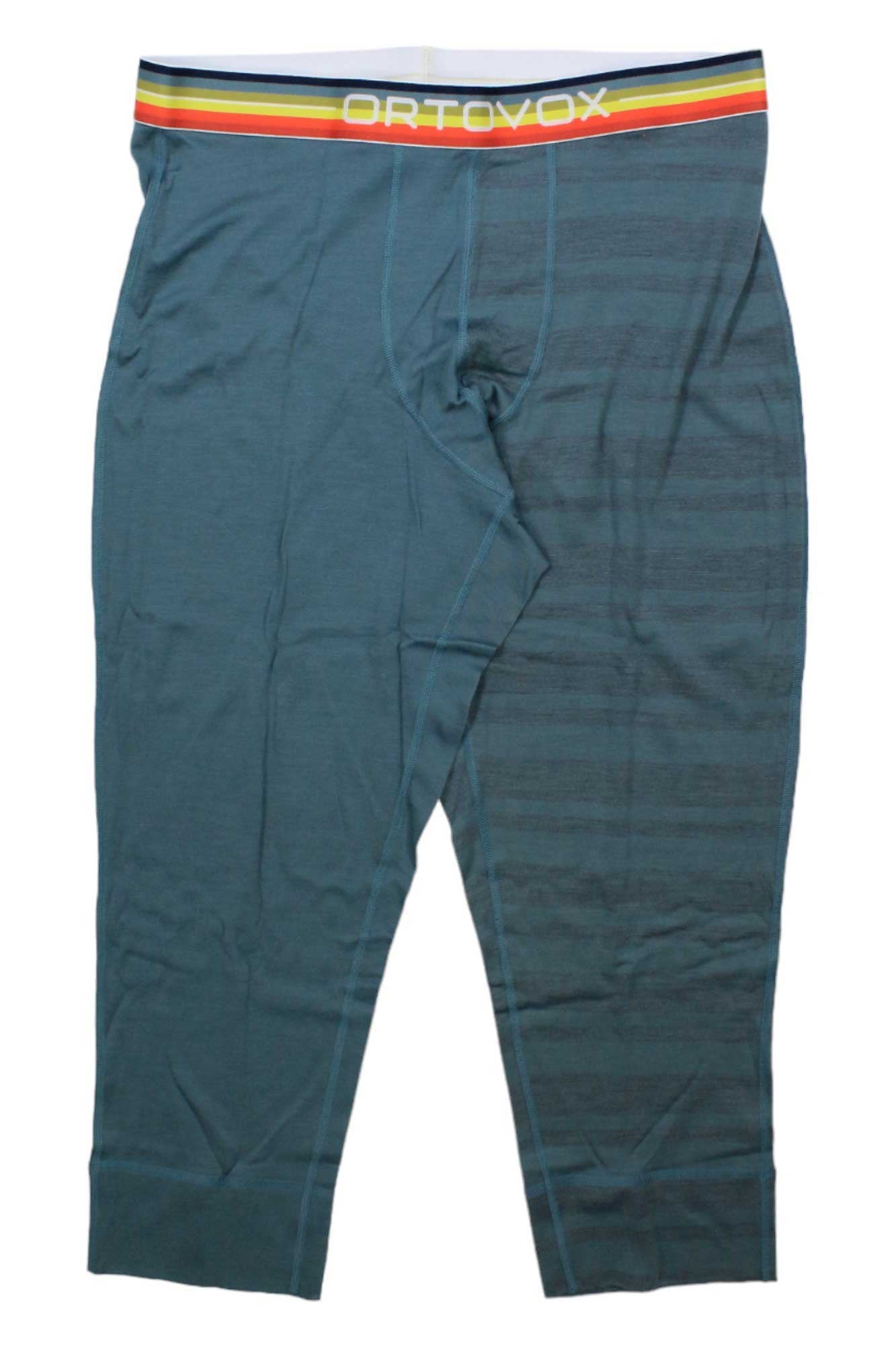 A pair of Ortovox Mens 185 RockNWool Short Pant in teal merino wool, featuring a multicolored waistband with the Ortovox name in yellow, is shown laid flat on a white background.