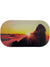 A mountain peak crowned with a cross soars above sunrise clouds, sunbeams streaming—an inspiring view for adventurers searching for eco-friendly gear like the GoggleSoc Protective Goggle Cover.