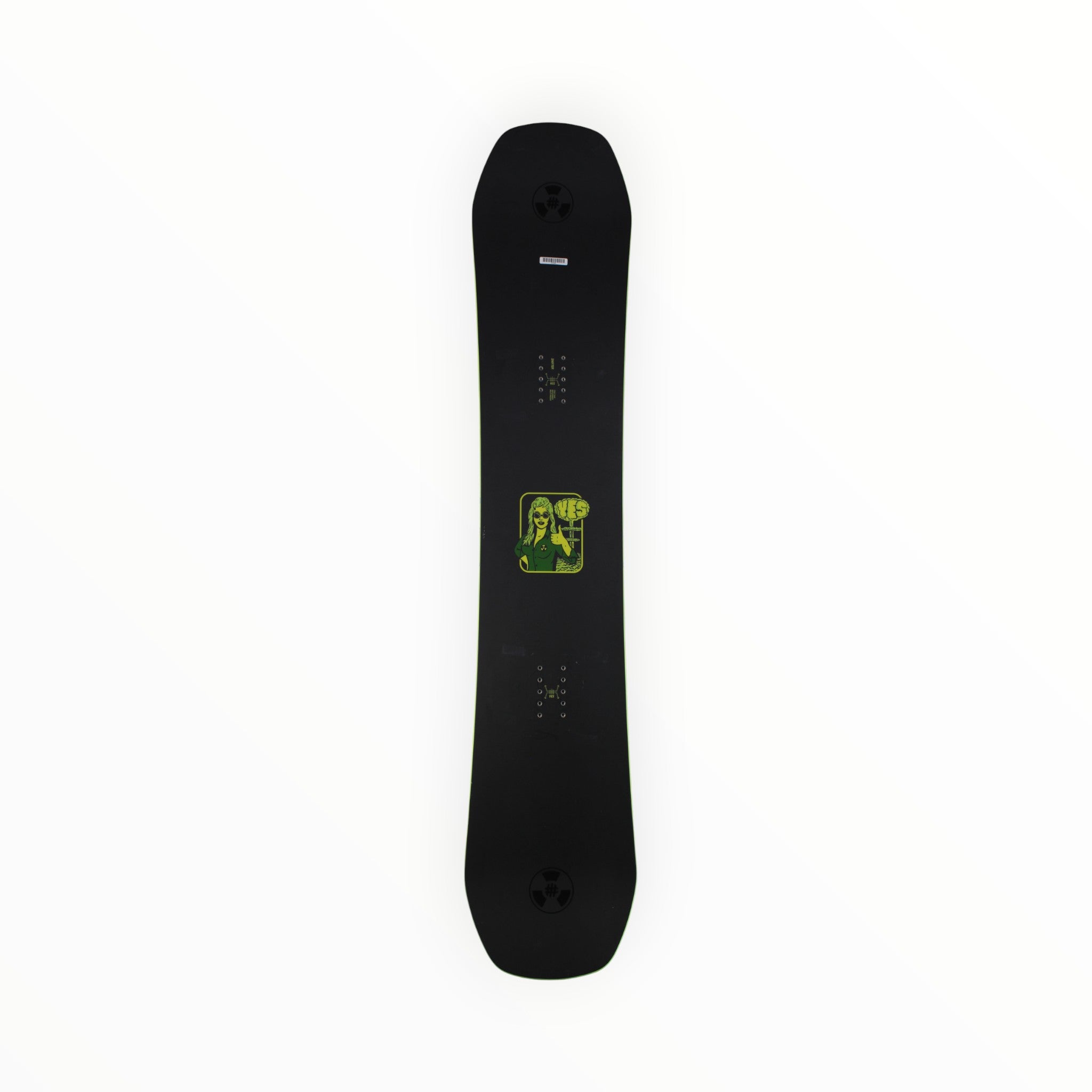 A YES Shifter Snowboard in black features a green and yellow graphic of a person holding up a peace sign at the center. The snowboard is photographed from above on a plain white background.