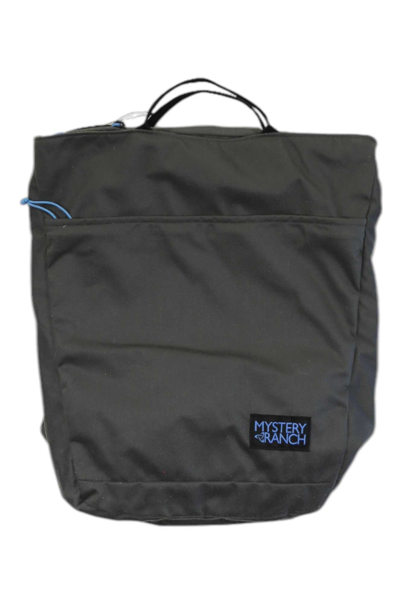 Super Market Bag in dark gray with top handles and Mystery Ranch logo patch.