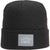 The Pistil Men's Morris Beanie is a black recycled polyester hat with a folded brim, featuring a gray patch with outlined mountain shapes and "PISTIL" on the front—ideal for hiking adventures.