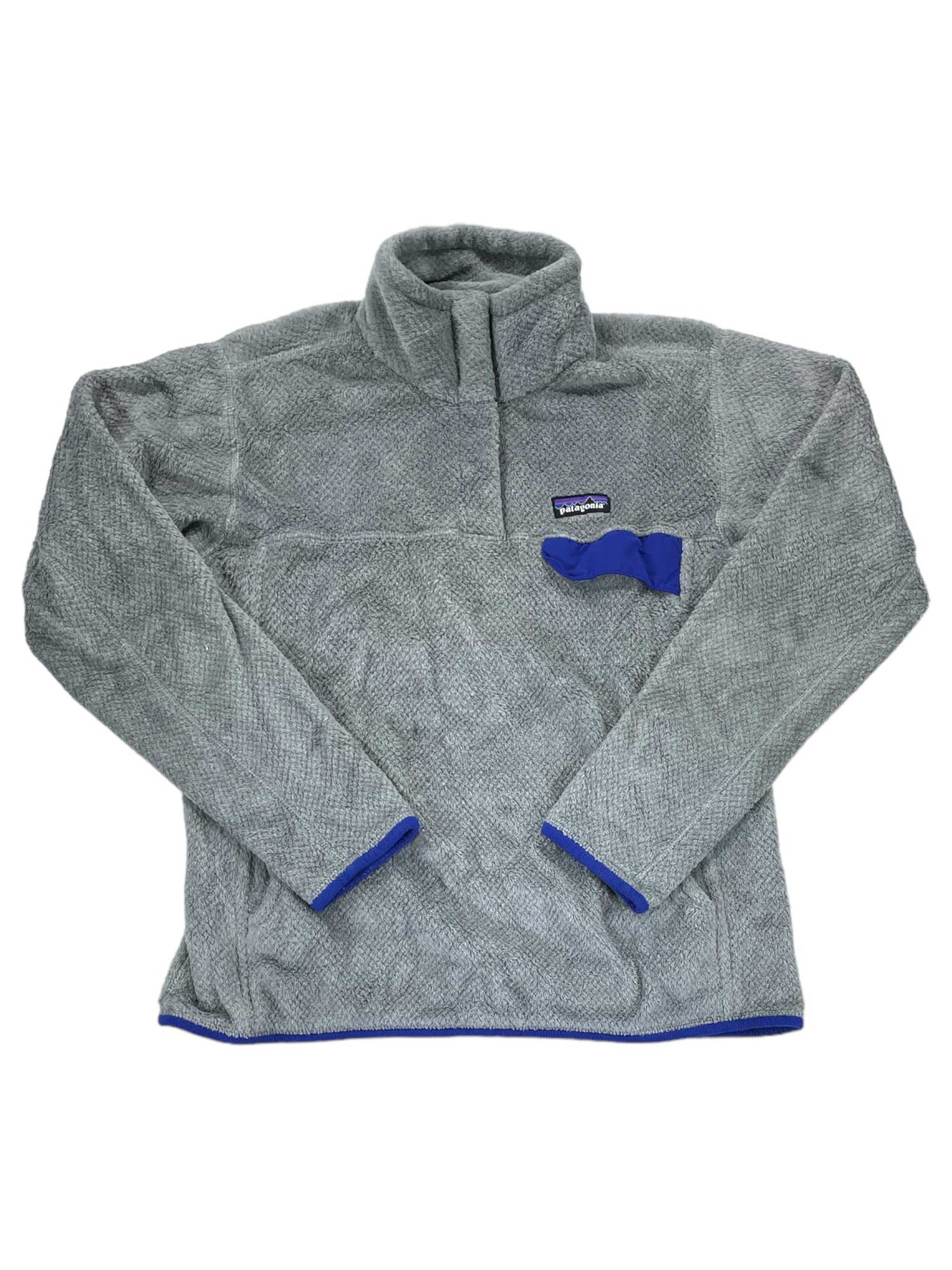 The Women's Re-Tool Snap-T Pullover is a light gray Polartec Thermal Pro fleece with a stand-up collar, quarter-snap front, blue trim at cuffs and hem, zippered chest pocket with blue detail, and a small Patagonia logo on the chest.