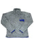 The Women's Re-Tool Snap-T Pullover is a light gray Polartec Thermal Pro fleece with a stand-up collar, quarter-snap front, blue trim at cuffs and hem, zippered chest pocket with blue detail, and a small Patagonia logo on the chest.