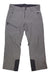 Obermeyer Men's Force Pant in gray, made with stretch fabric and HydroBlock Pro, features black reinforced inner ankle patches, front zipper pockets, belt loops, and two snap buttons at the waistband. Shown laid flat on a white background.