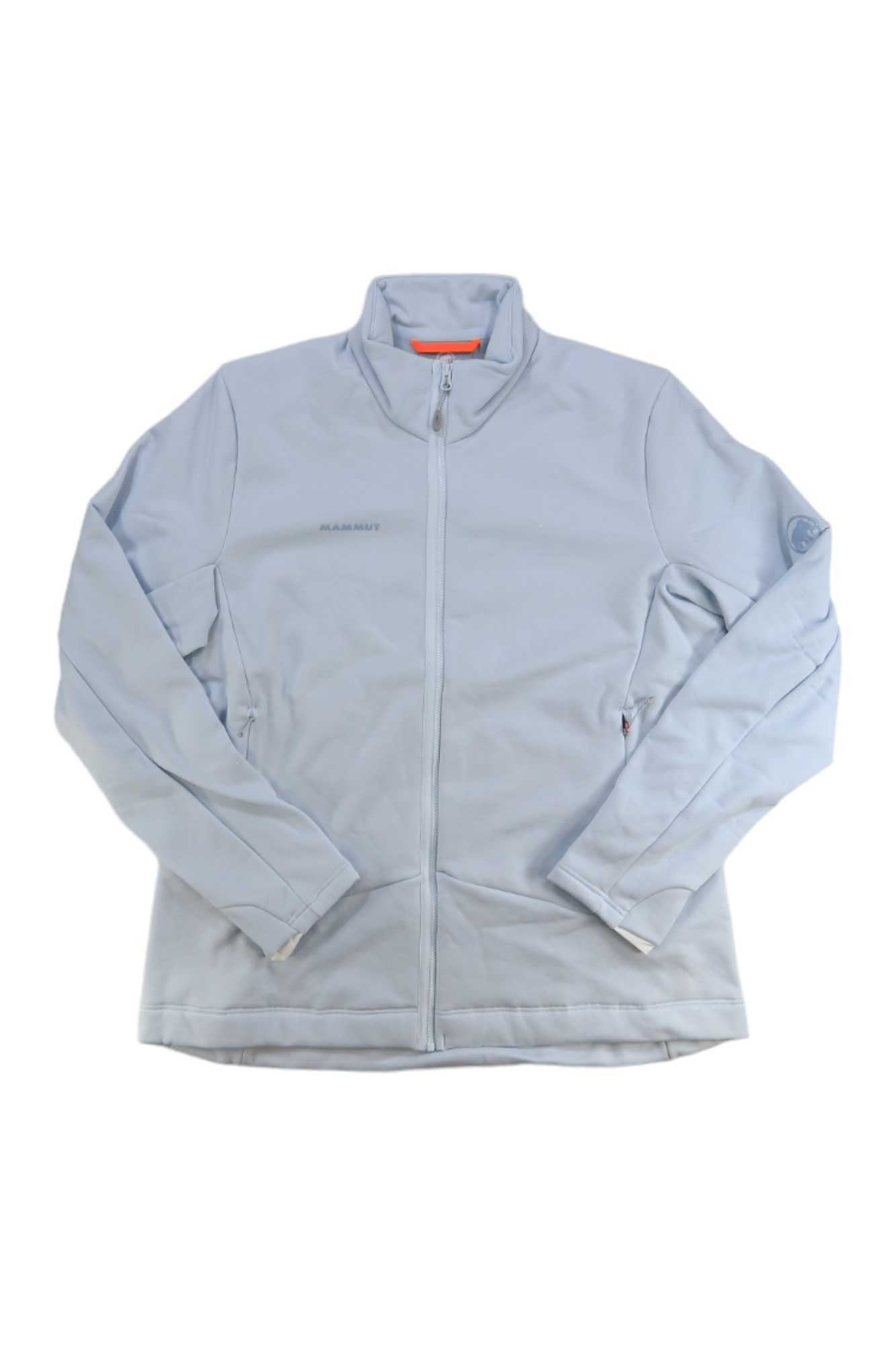 Light blue Mammut Womens Aconcagua ML Jacket with Polartec Power Stretch Pro, long sleeves, high collar, two side pockets, and subtle chest and sleeve branding, shown laid flat on white. Perfect climbing jacket.