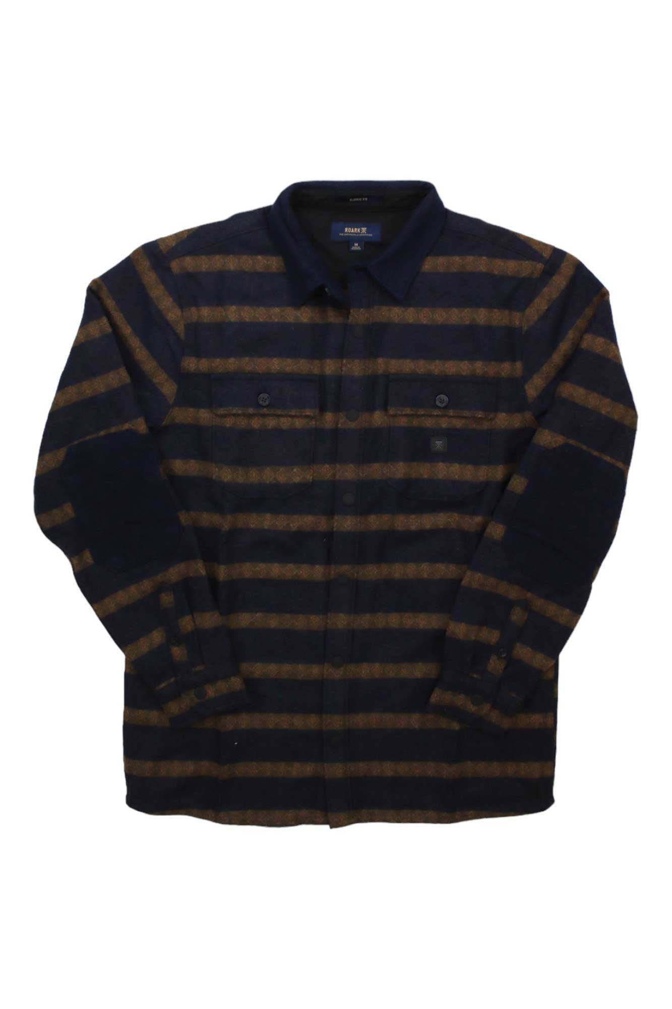 The Roark Mens Nordsman Shirt is a collared, long-sleeve button-up flannel with horizontal brown and black stripes and chest pockets.
