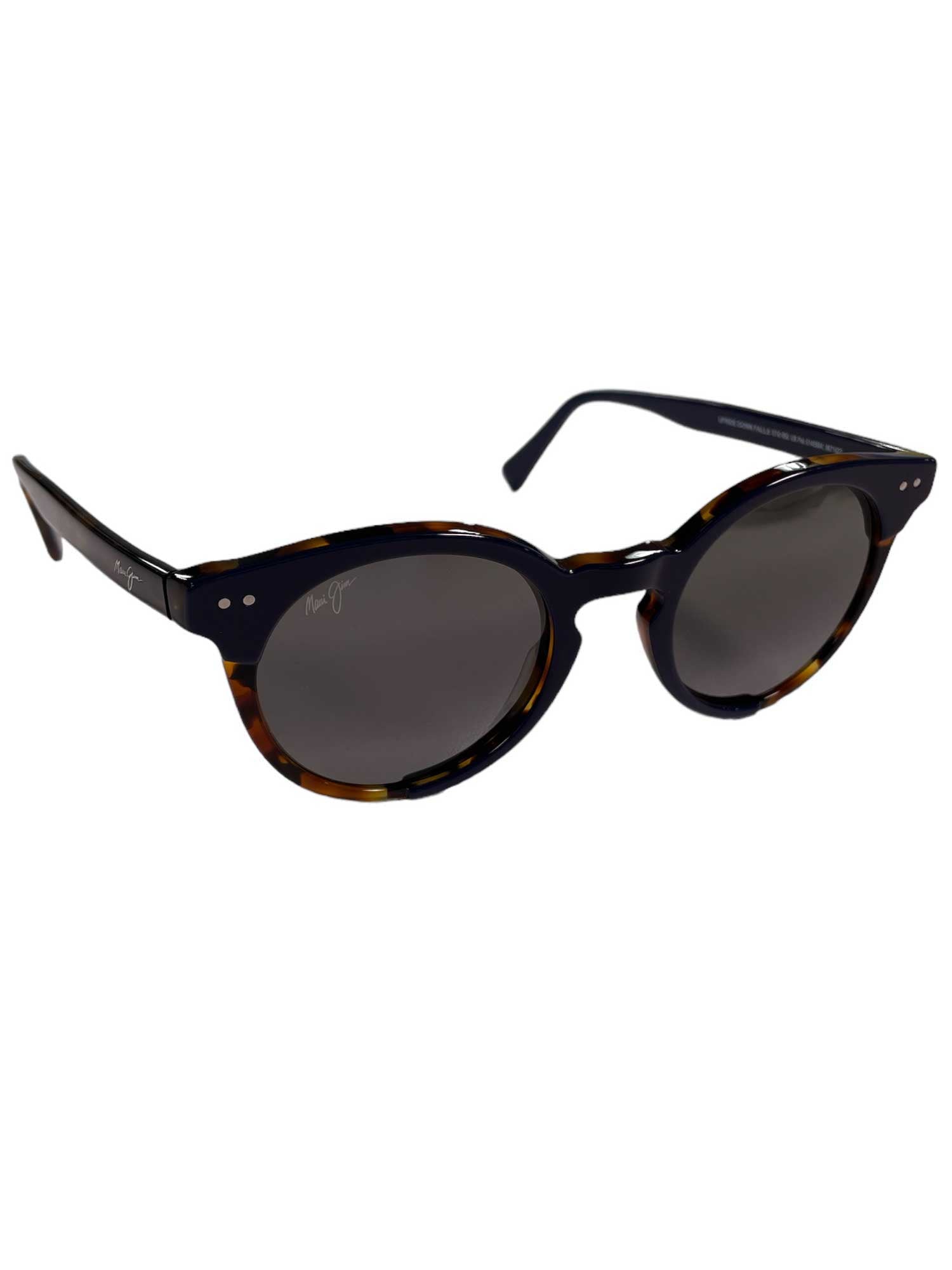 The Maui Jim Upside Down Falls Sunglasses feature round tortoiseshell frames, Neutral Grey SuperThin Glass lenses, subtle metallic hinge accents, and black arms with a signature logo.