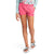 Wearing a long-sleeve patterned shirt, Girls Class V Water Short in bright pink, and white The North Face slide sandals, a person stands against a white background with only their lower half visible.