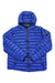 The NOIZE Men's Finnigan Jacket is a bright blue puff jacket with recycled fill insulation, a hood, black zipper and trim on pockets and cuffs, plus a round logo patch on the left sleeve. It is shown laid flat against a white background.