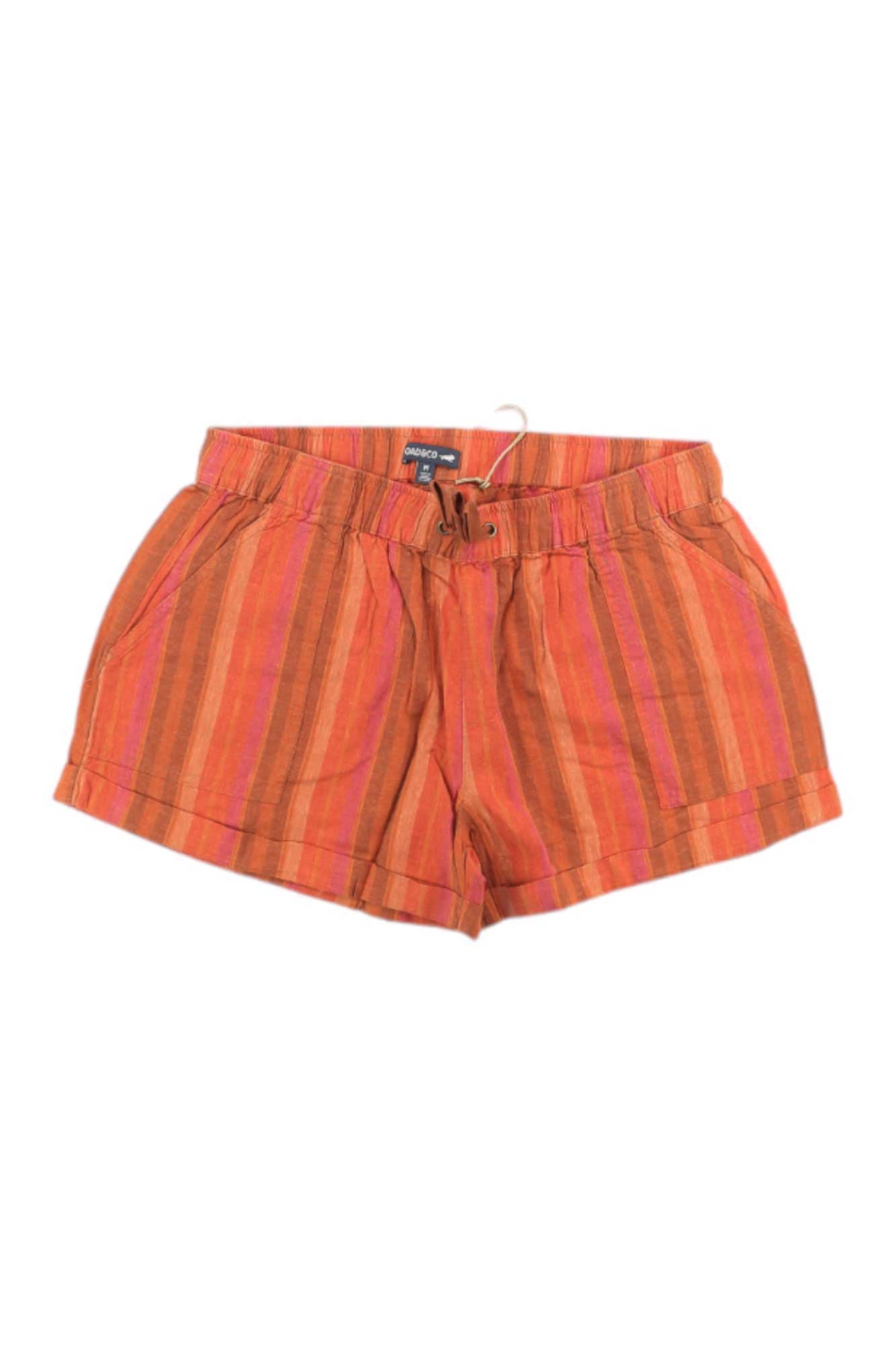 The Toad & Co Womens Taj Hemp 3 Inch Short, featuring orange and pink stripes, an elastic waistband with drawstring, side pockets, and moisture-wicking fabric, is shown laid flat on a white background.