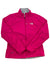 A bright pink Women's Apex Bionic Soft-Shell Jacket by The North Face, featuring a front zipper, high collar, and zippered side pockets. Displayed flat on a white background, this windproof jacket offers stylish protection from the elements.
