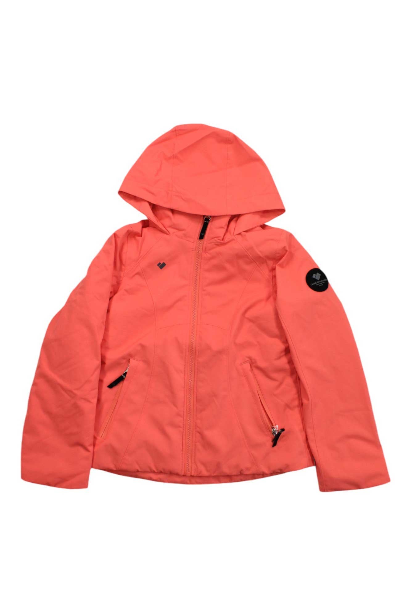 The Obermeyer Girls Rylee Jacket in bright coral pink features a front zipper, two zippered side pockets, and a black circular patch on the upper left sleeve—ideal as a girls’ ski or outdoor jacket.