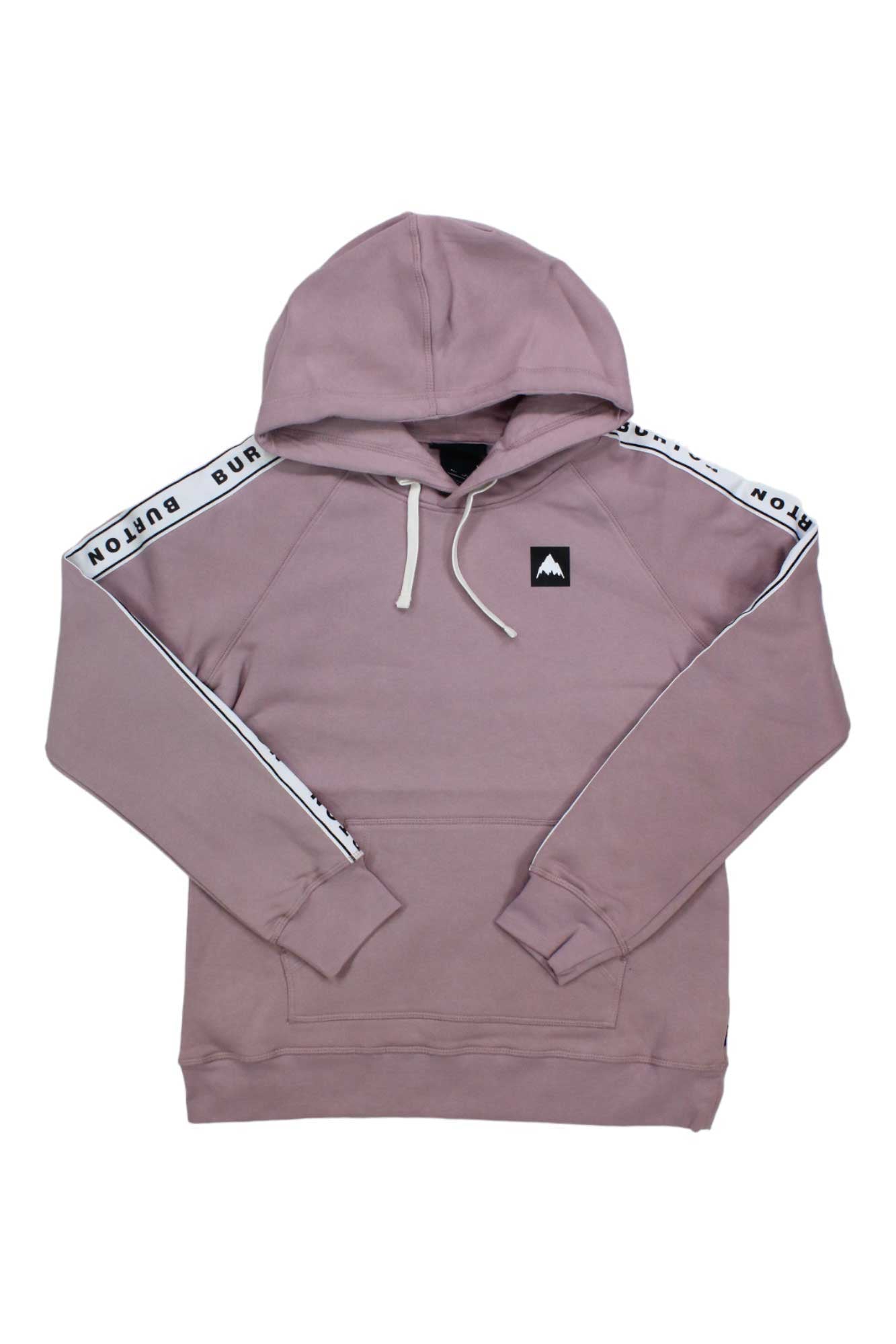 The Burton Women's Lost Things Pullover Hoodie is mauve with white drawstrings, a front pocket, white Burton text tape on the sleeves, and a black chest patch featuring a white mountain logo.