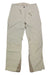 The Salomon Women's Brilliant Pant in beige features zipper pockets, reinforced knees and ankles, and PrimaLoft insulation for warmth. Displayed flat on a white background, these insulated ski pants also show a logo on the left thigh.