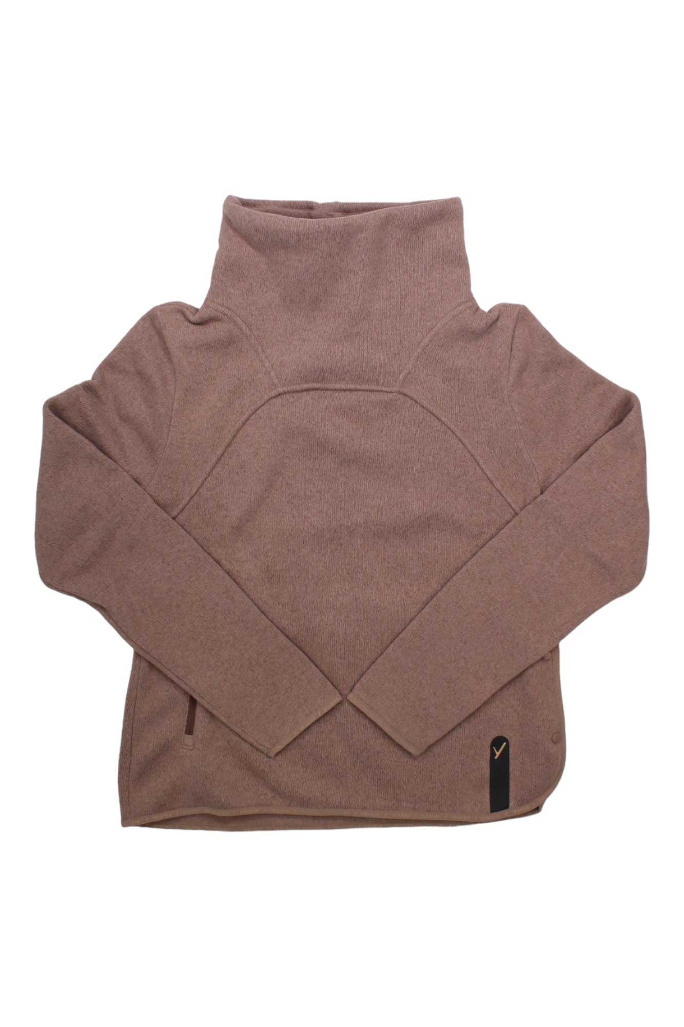 The Indyeva Womens Toga Sweater is a light brown, long-sleeve top with a high collar and crossed sleeves, laid flat and finished with a black tag near the hem—crafted from recycled polyester for casual comfort.