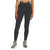 A person wearing The North Face Womens Bridgeway Hybrid Tight high-waisted fitness pants in black and green hiking shoes stands against a plain white background. Only the lower body is visible; the upper body and head are cropped out.