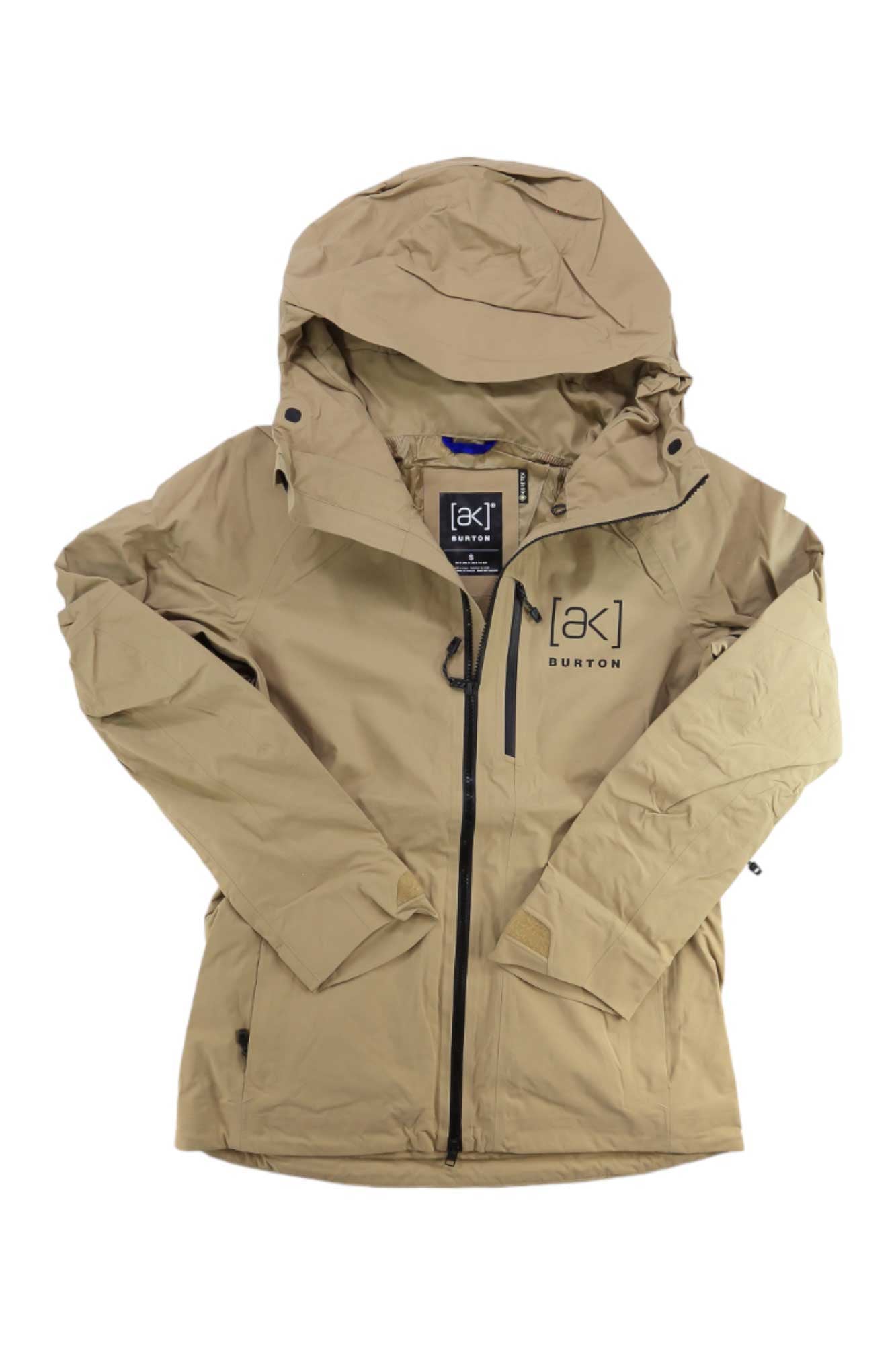 The Burton Women's AK GTX Upshift Jacket is a tan, waterproof GORE-TEX jacket with a hood, front zipper, long sleeves, and features the [ak] logo and Burton branding on the left chest.