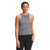 A woman wears a grey Womens Vyrtue Tank with FlashDry-XD technology from The North Face and black leggings.