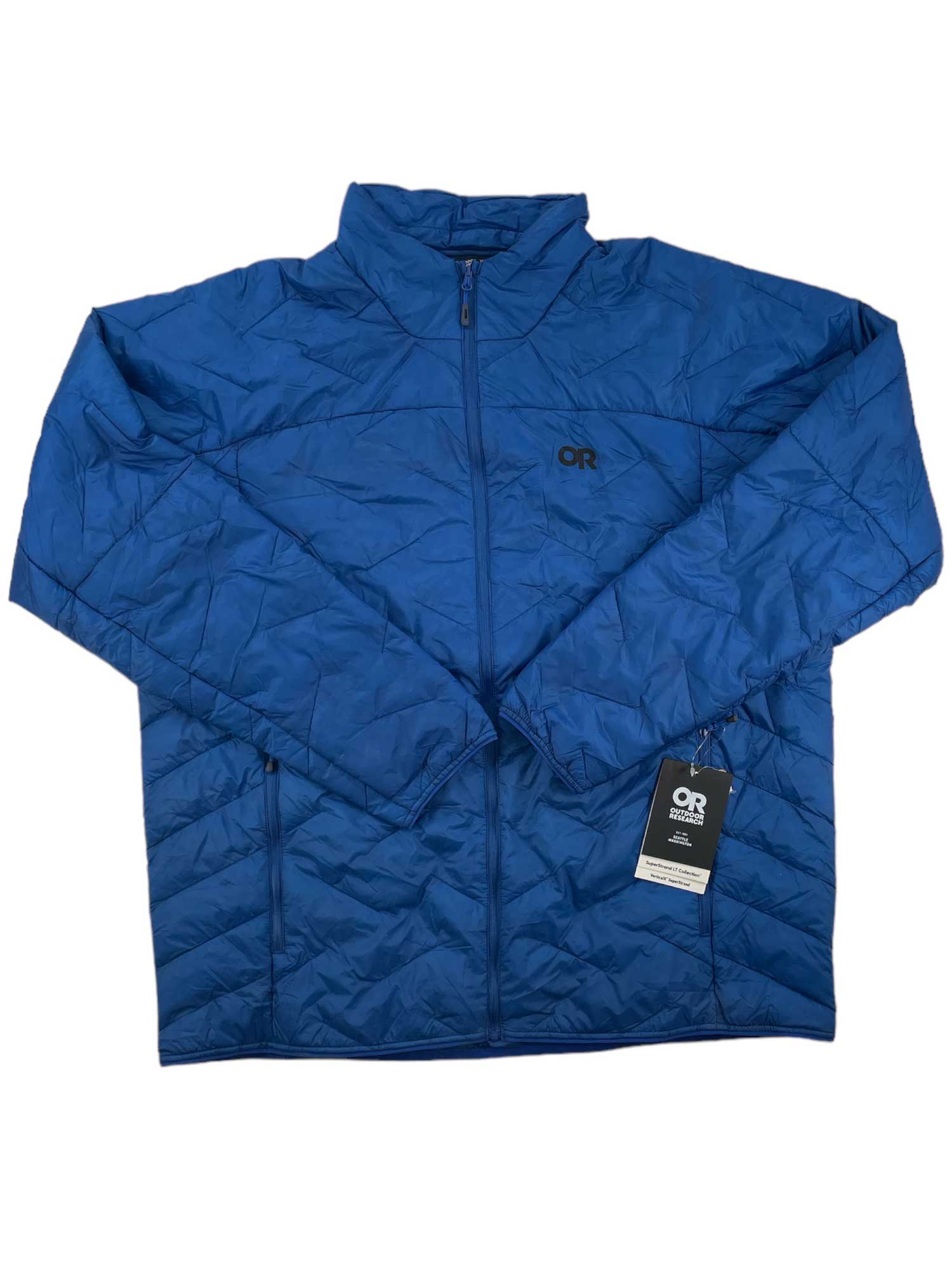 The Outdoor Research Men's SuperStrand LT Jacket is a blue, ultralight quilted jacket with a front zipper, long sleeves, and a small OR logo on the left chest. Tags attached show this packable jacket is new.