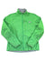 The North Face Womens Apex Bionic Soft-Shell Jacket in bright green features long sleeves, a high collar, side pockets, and a visible logo on the left chest. The windproof jacket is laid flat on a white background.