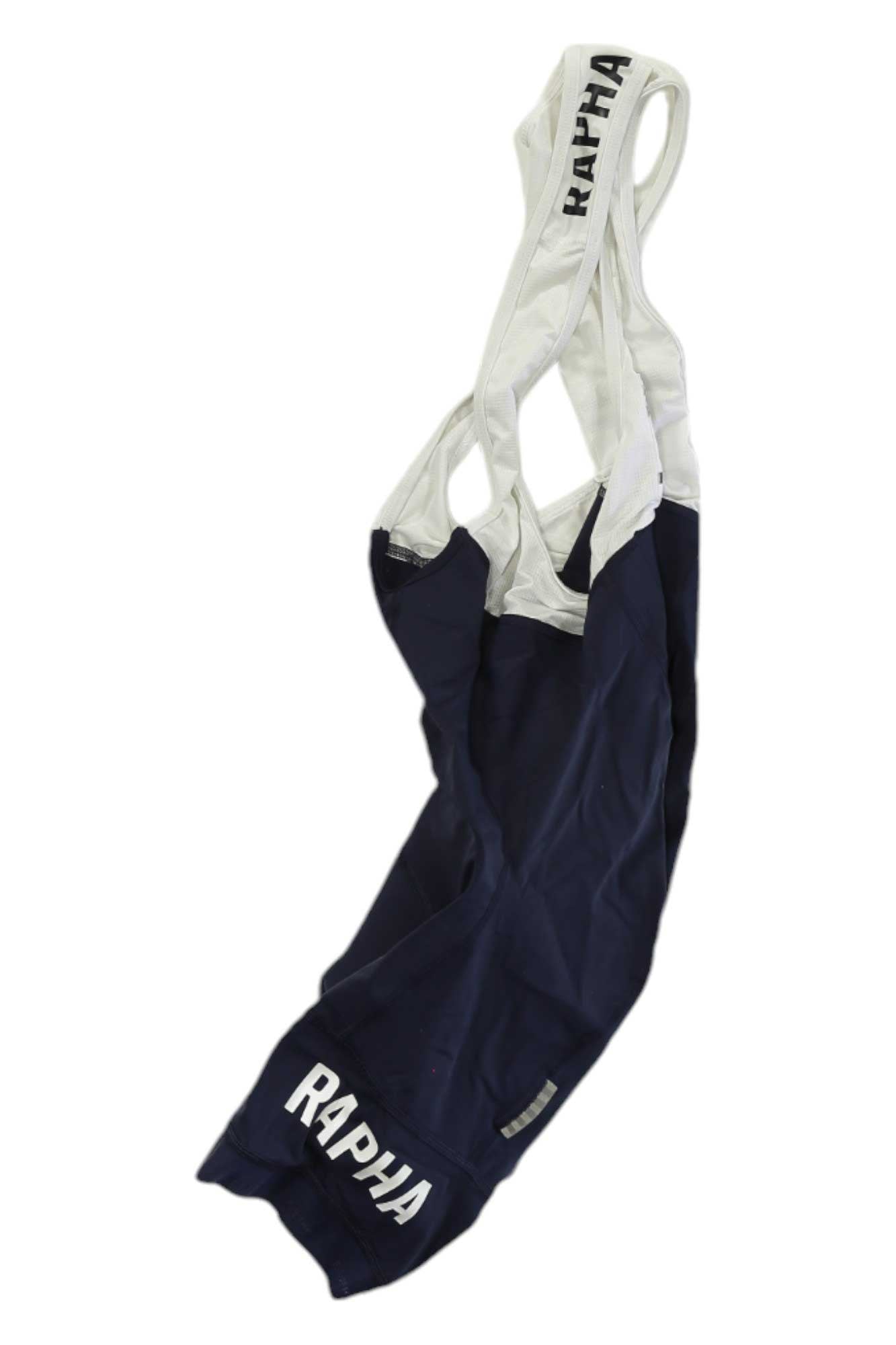 The Rapha Mens Pro Team Training Bib Shorts in navy blue and white feature an ergonomic chamois and RAPHA branding on the leg and straps, shown against a plain white background—perfect for high-performance cycling.