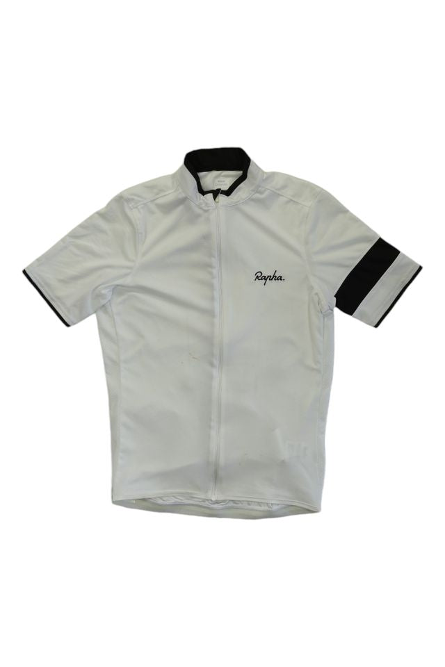 The Rapha Mens Super Lightweight Jersey is a white short-sleeve cycling jersey featuring a black collar, left-sleeve armband, chest Rapha. logo, full front zipper, and a minimalist design.