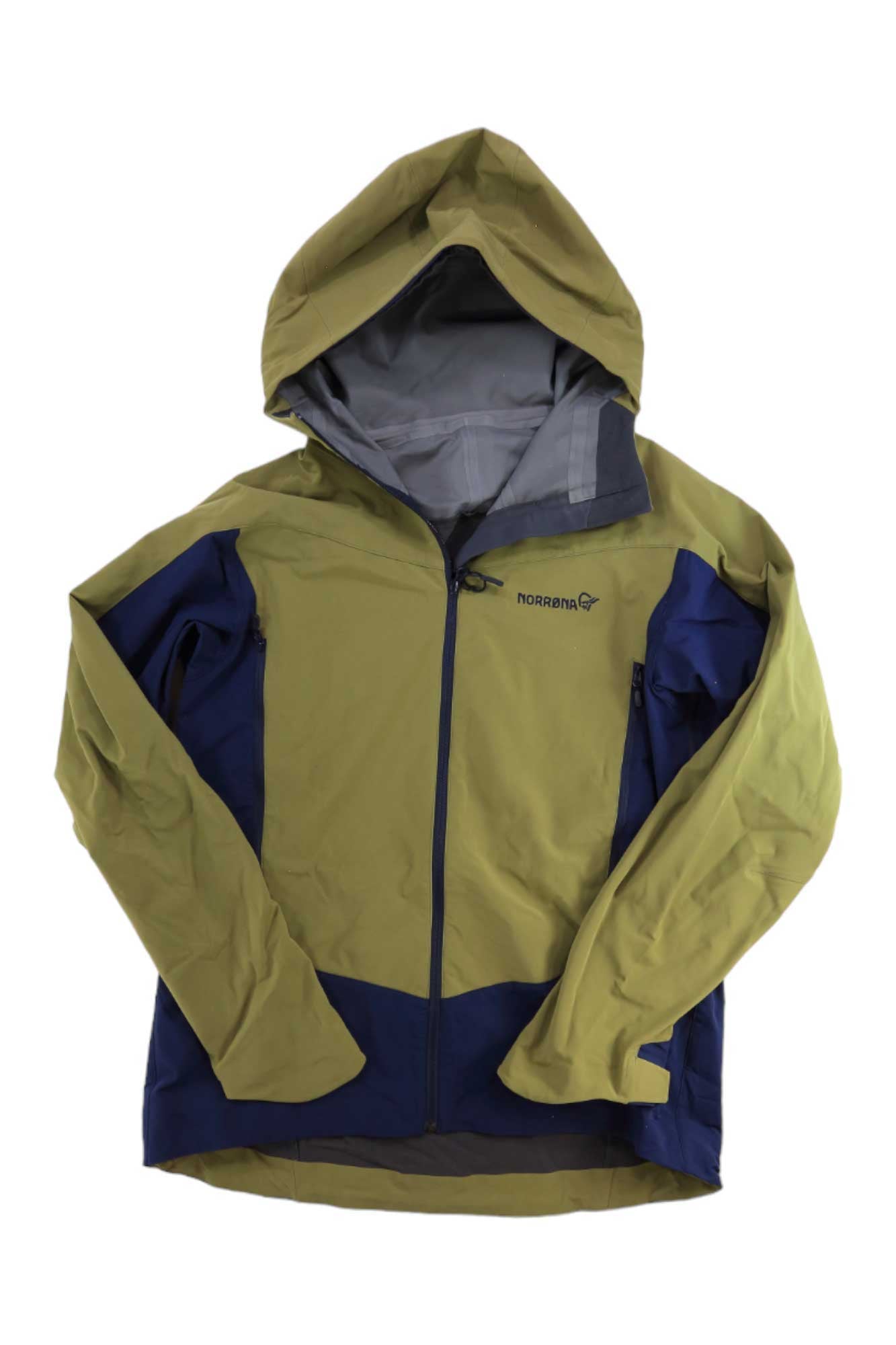 The Norrona Men's Tamok GTX Thermo80 Jacket is a lightweight, waterproof ski jacket made with recycled polyester. It features olive green and navy blue panels, a front zipper, two side pockets, and NORRONA branding for outdoor use.