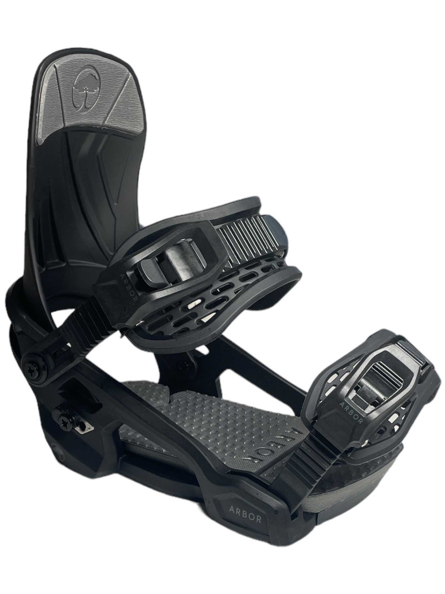 The Arbor Womens Acacia Snowboard Binding is black with an ergonomic fit, adjustable straps and buckles, a sturdy highback, textured footbed for grip, and the Arbor logo on its lightweight baseplate.