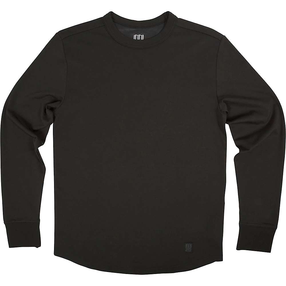 The Topo Designs Men's Long Sleeve Tech Tee in black is shown laid flat on a white background with a front view, no visible logos or designs except a small black tag—an ideal travel-friendly shirt featuring antimicrobial fabric.