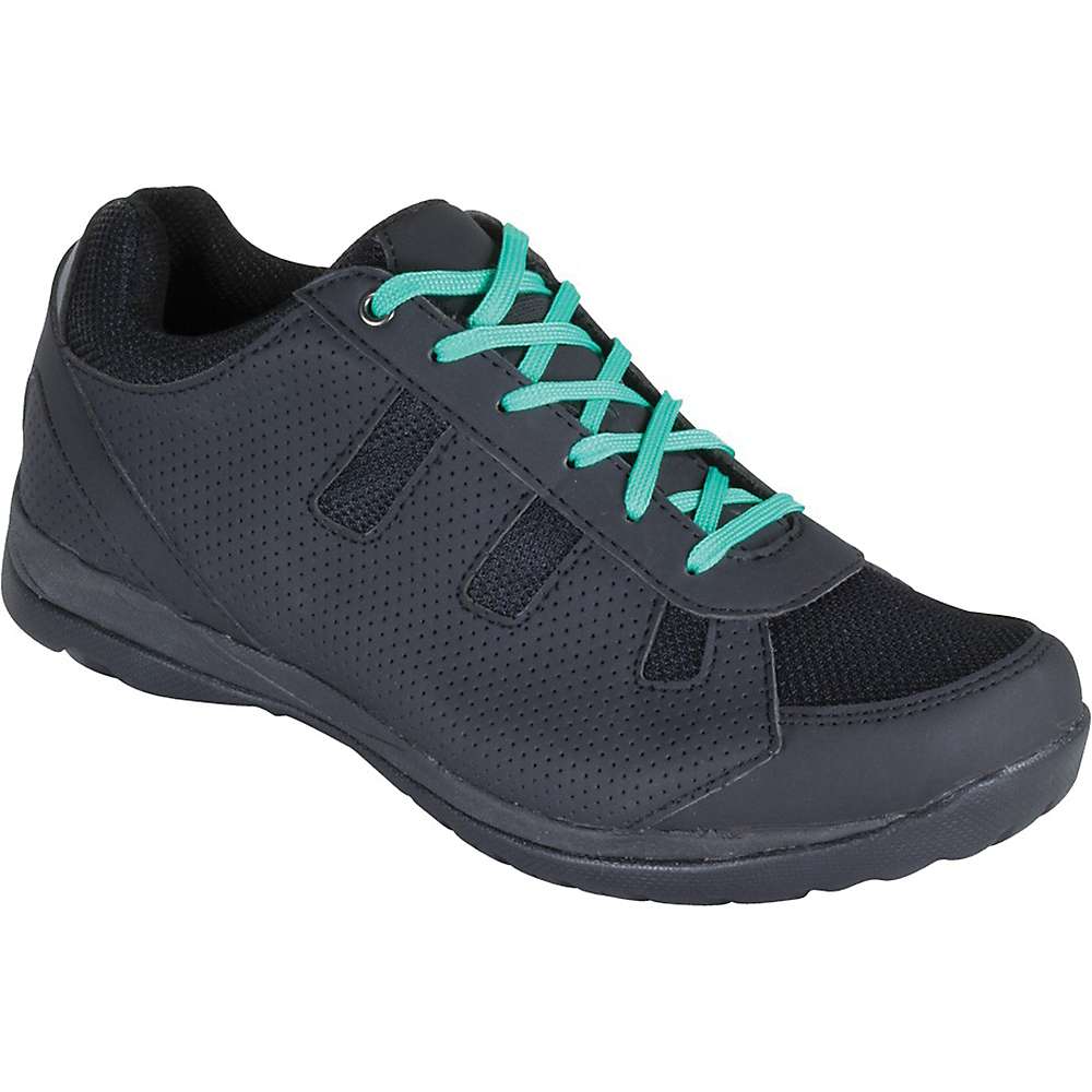 The Serfas Women's Trax Cycling Shoes in black feature perforated sides, black mesh accents, bright teal-green laces, and a wide toe box for comfort—shown on a white background.