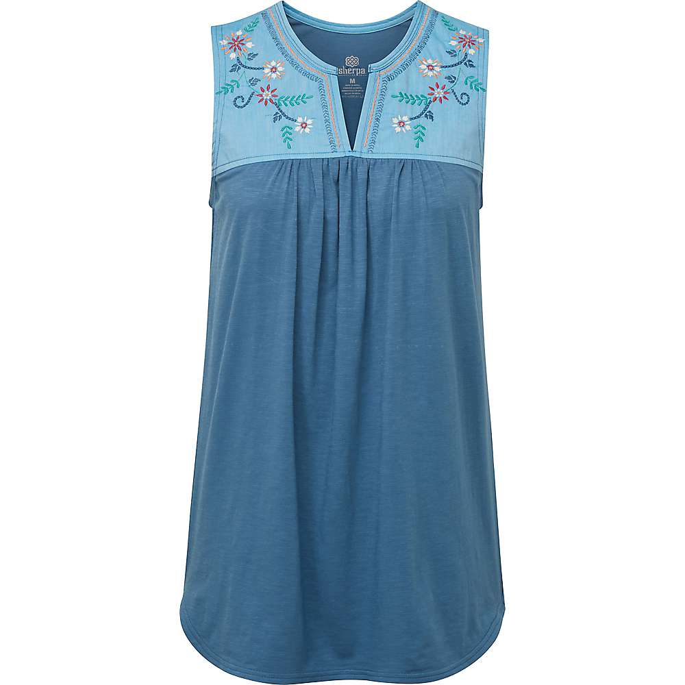 The Sherpa Women's Shaanti Embroidery Top in XXL is a sleeveless blue top with a rounded hem, pleated front, and a yoke of light blue fabric adorned with colorful Nepal-inspired floral embroidery and a V-notch neckline.