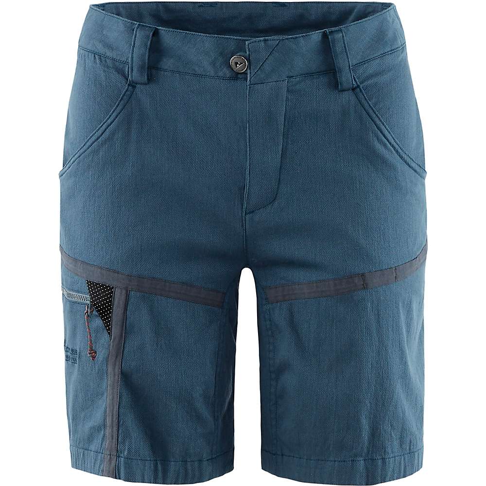 The Klattermusen Women's Gefjon Shorts in Midnight Blue are made from stretchable fabric and feature a front button and zip closure, belt loops, side pockets, plus a zippered thigh pocket with dark gray accents—ideal sustainable activewear.
