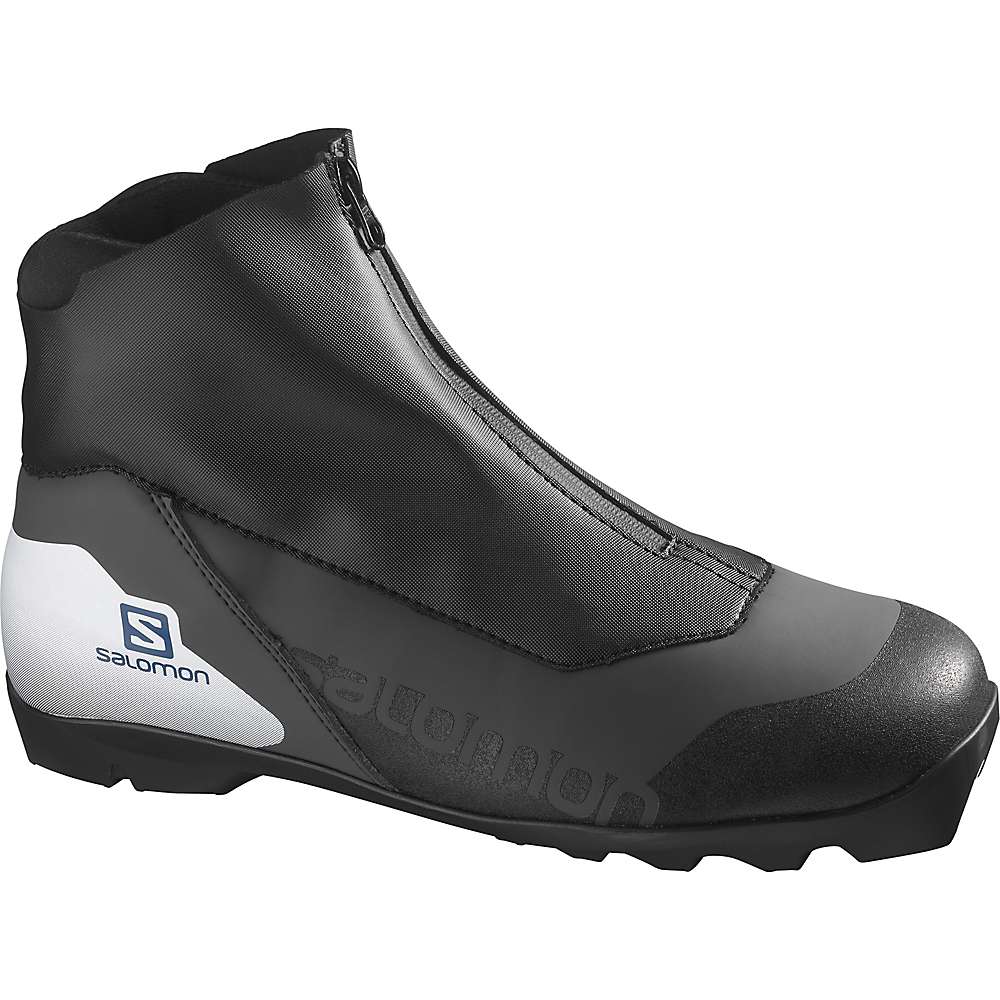 The Salomon Men's Escape Prolink Ski Boot features a black and gray design, zippered cover, rugged sole, and white heel with the Salomon logo—making it an ideal men’s touring ski boot for winter sports enthusiasts.