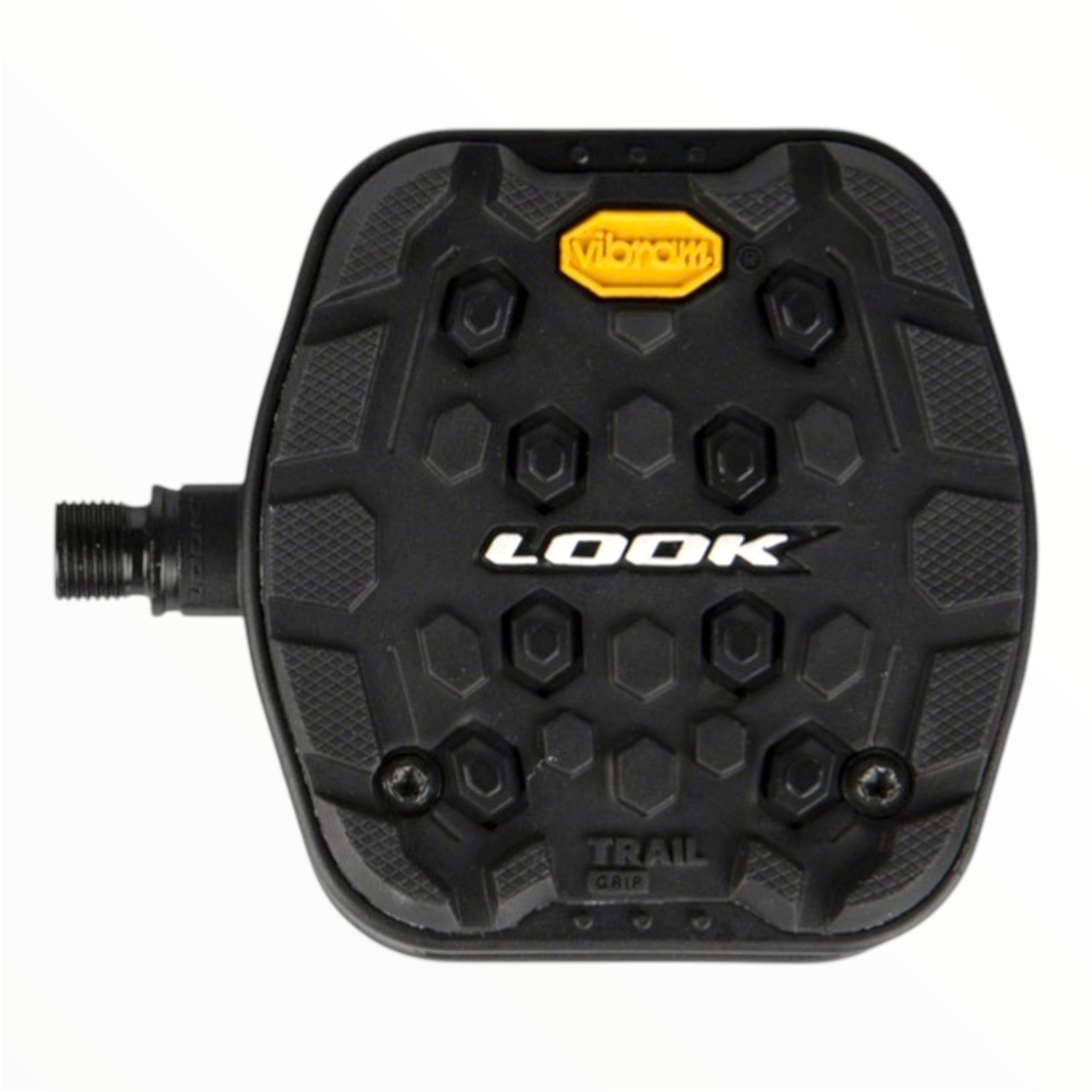 Black, flat Look Trail Grip pedal with a hexagonal pattern, white LOOK logo at the center, yellow Vibram Activ Grip at the top, TRAIL GRIP text below, grip pads, and visible screws for enhanced traction.