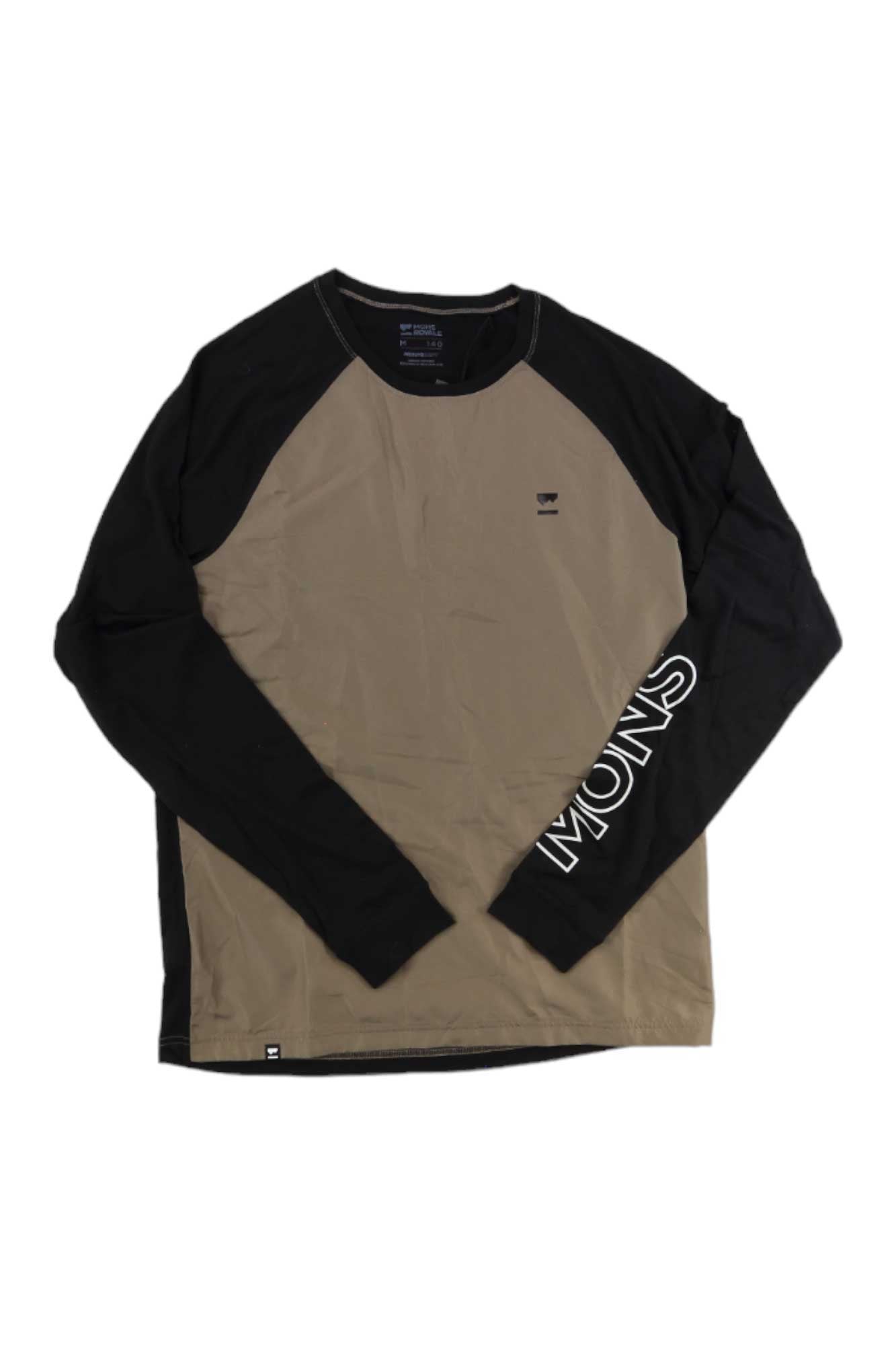 The Mons Royale Mens Tarn Merino Shift Wind Jersey features black raglan sleeves with "MOUNS" in white, a tan body, crew neckline, and a small black logo on the left chest—perfect for biking with wind jersey style.