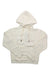 The Cotopaxi Womens Do Good Hoodie is a cream-colored, organic cotton hoodie with drawstrings and long sleeves. "DO GOOD" is subtly printed in white on the front, shown laid flat on a white background.