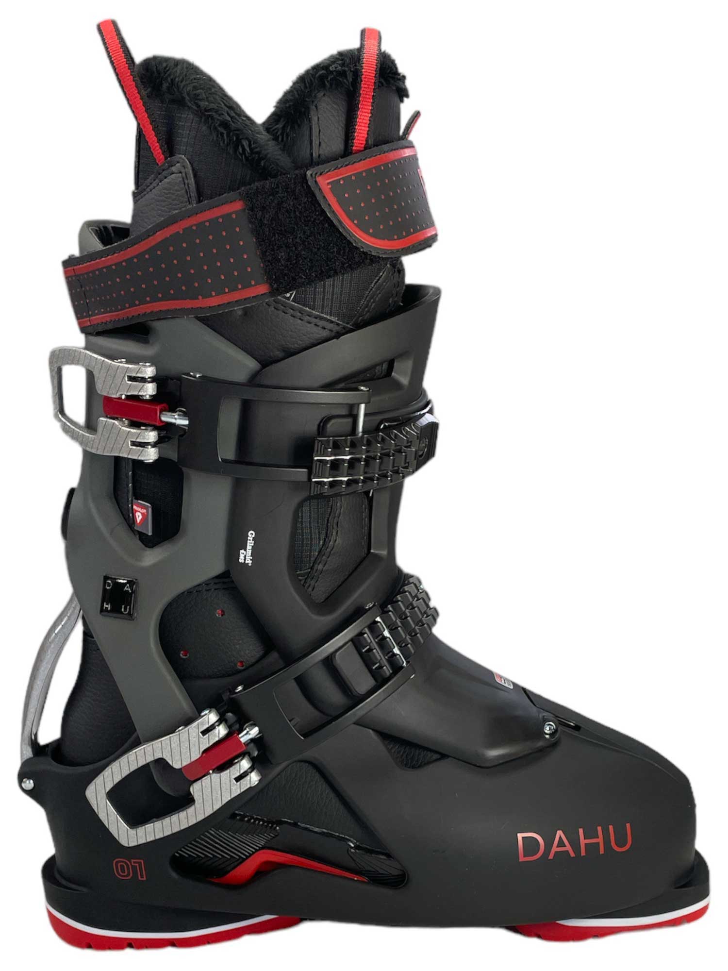 The Dahu Men's Ecorce 01 M120 Flex Ski Boot features a black and red design, multiple silver buckles and straps, Primaloft insulation, DAHU branding on the side, and a sturdy ergonomic build ideal for all-mountain skiing.