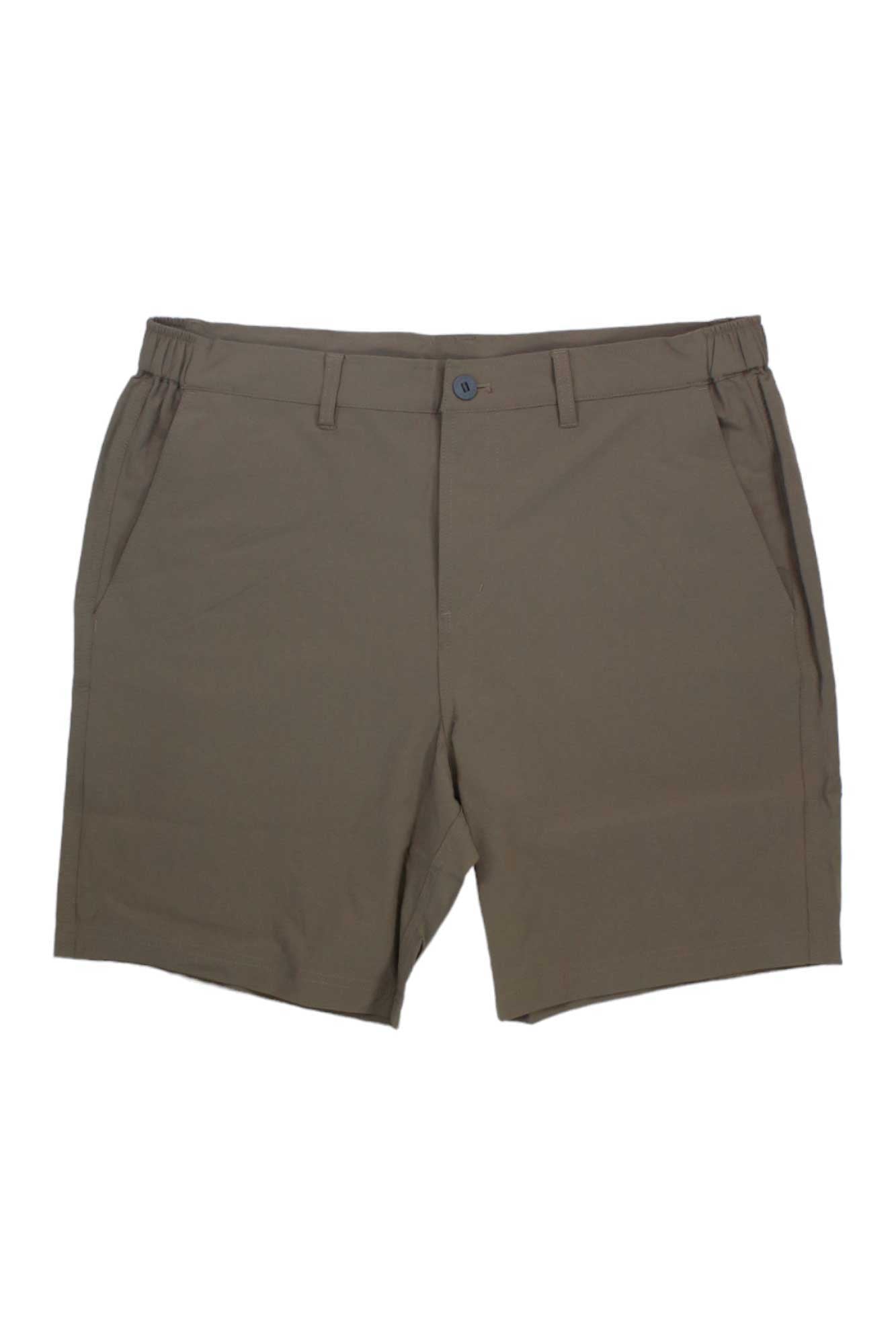 The Free Fly Men's Latitude 7.5 Inch Short in khaki, featuring belt loops, a button closure, UV protection, and side pockets, is displayed laid flat on a white background.