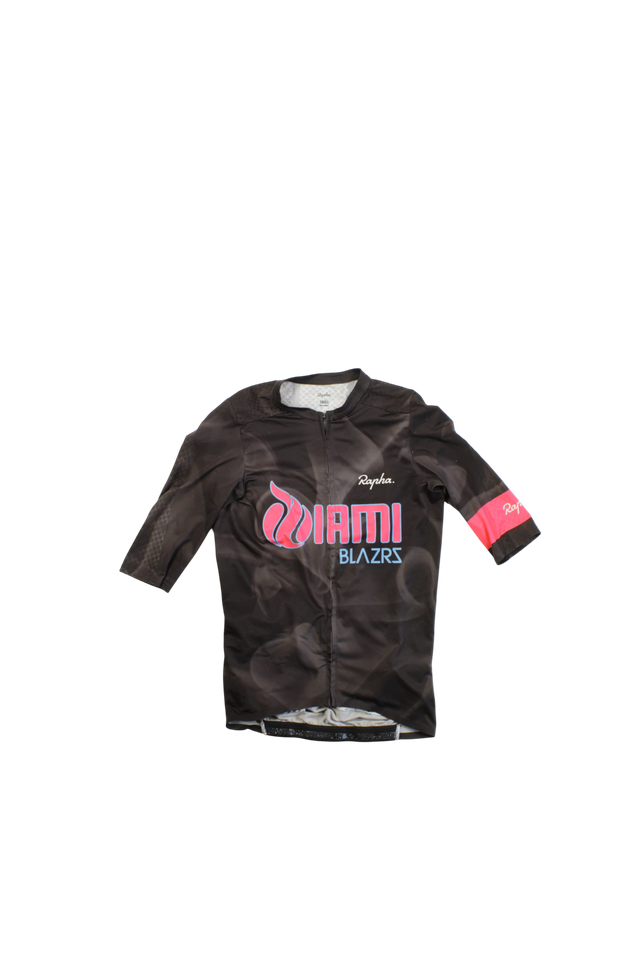 The Pro Team Aero Jersey II is a black cycling jersey with "Miami Blazers" in pink and blue on the front and a pink Rapha logo on the left sleeve, shown against a plain white background.