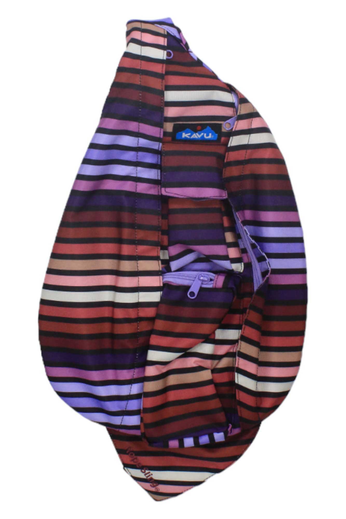 The KAVU Womens Rope Sling Bag features purple, red, and brown stripes, water-resistant 600D polyester, the KAVU logo, a main zippered pocket, and a front pocket—both with purple zippers.