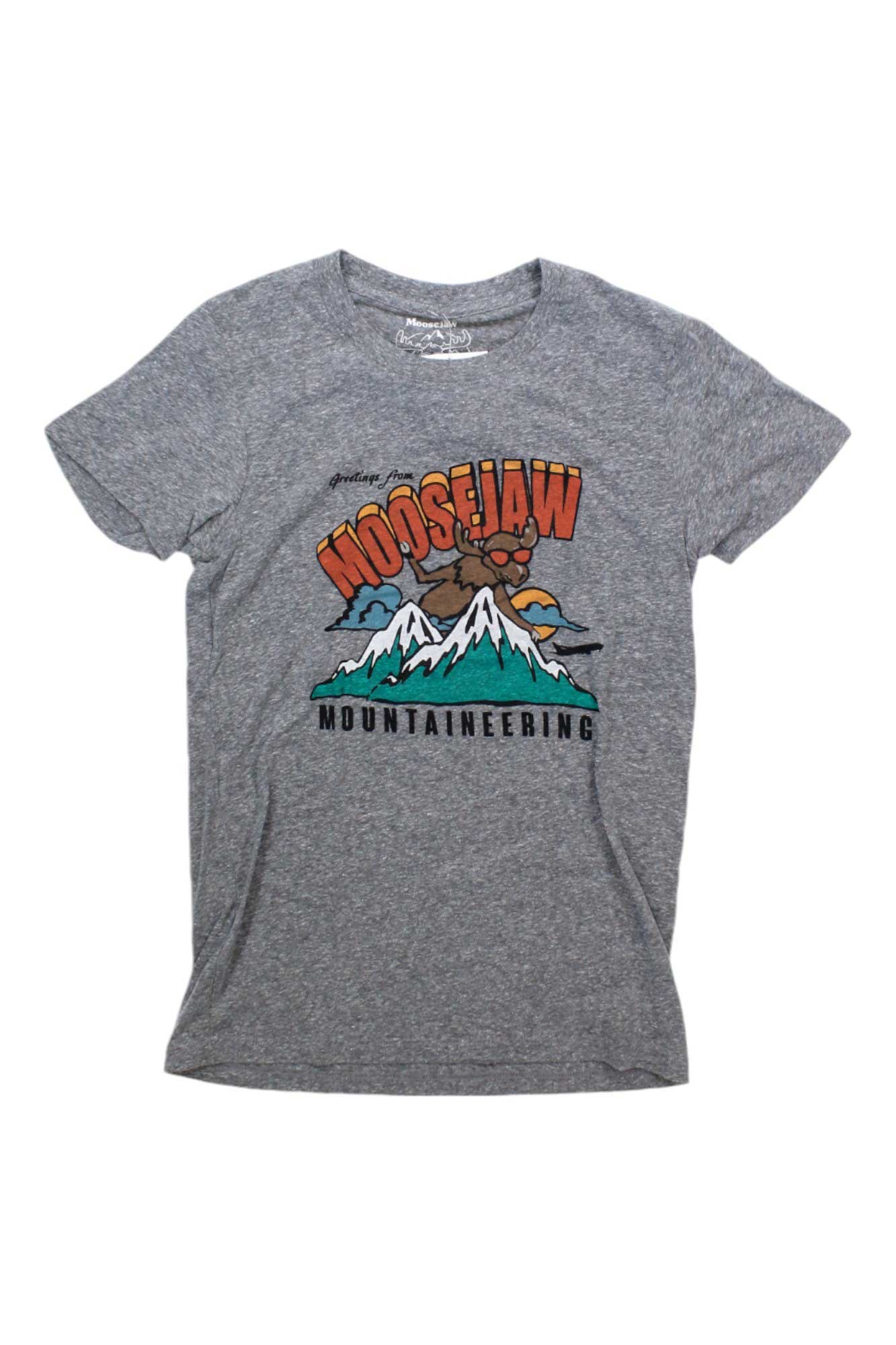 The Moosejaw Womens Peanut SS Tee is a soft gray crew neck short sleeve shirt with a colorful retro graphic of mountains, a cartoon moose, and “Greetings from Moosejaw Mountaineering” on the front.