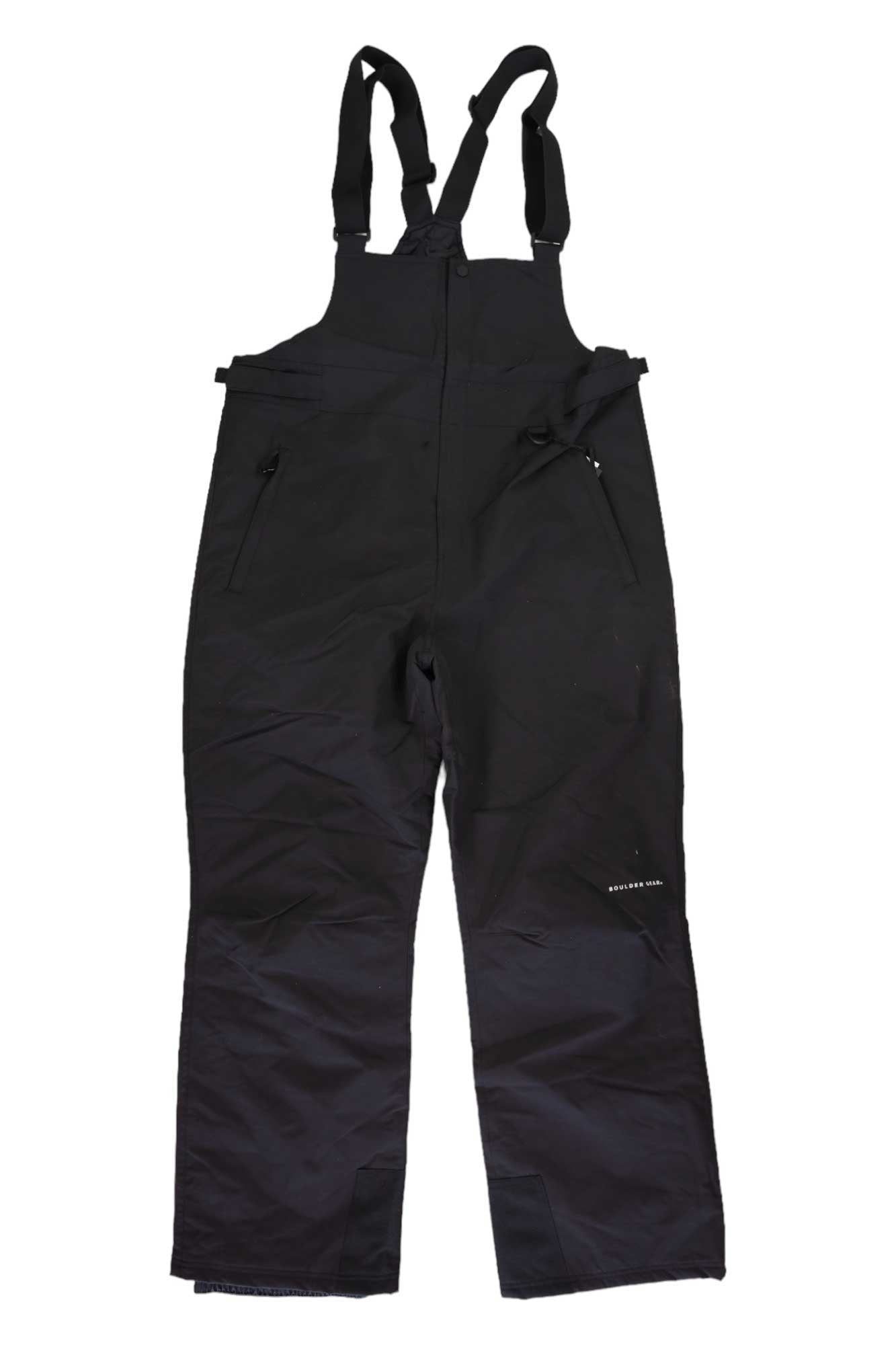 Pinnacle Bib Ski Pants—black, insulated bibs with adjustable shoulder straps, front zipper, and side zippered pockets—laid flat on a white background; perfect for men's alpine adventures.