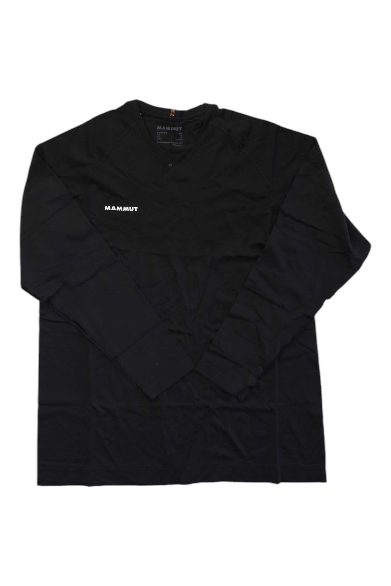 The Mammut Mens Trift Longsleeve Shirt is a black seamless men's hiking shirt with a white Mammut logo on the left chest, shown laid flat on a white background.