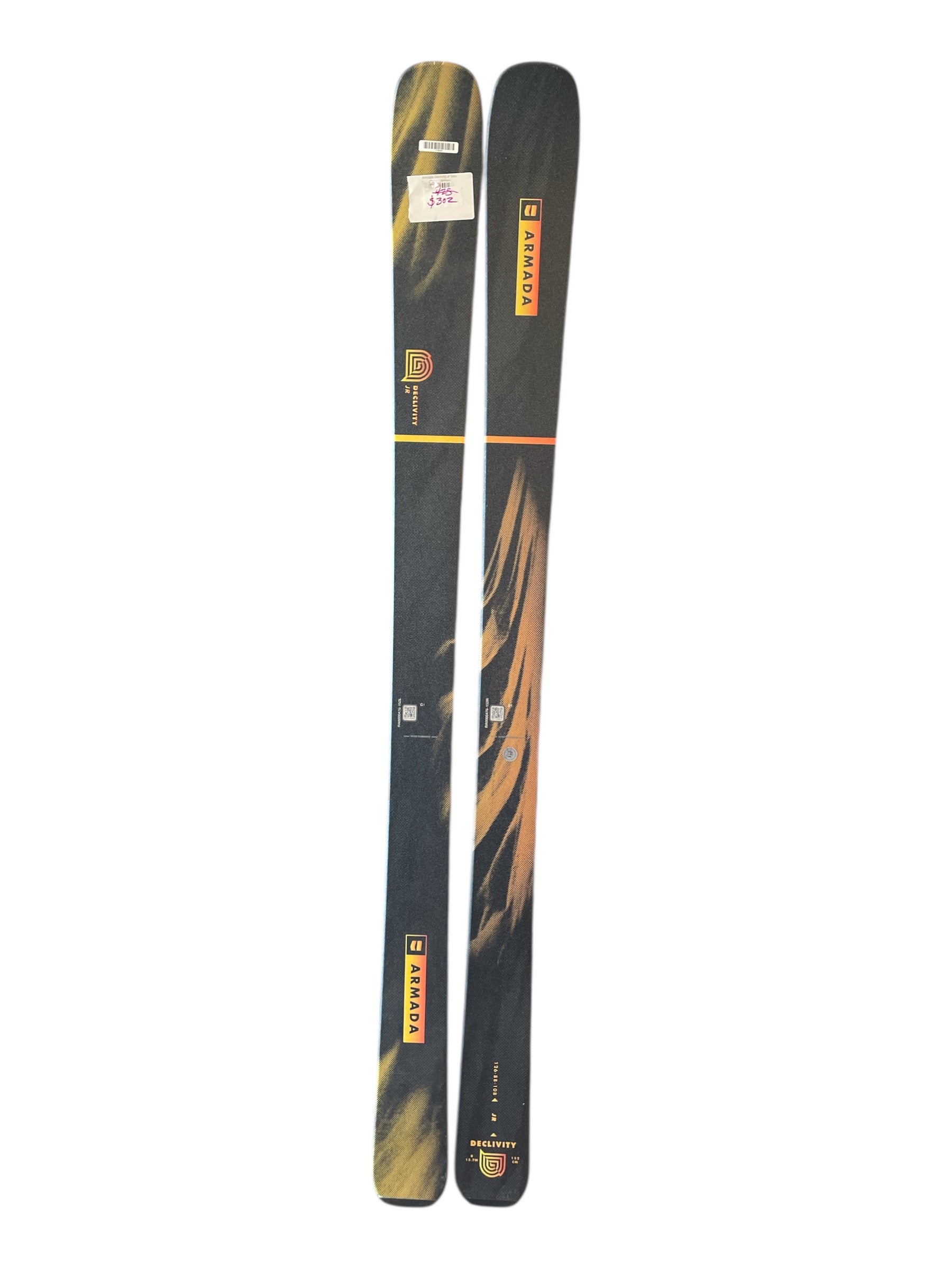 A pair of Armada Declivity Jr Skis, all-mountain with a dark design and yellow-orange accents and logos along each ski, ideal for intermediate-advanced skiers, shown side by side on a white background.