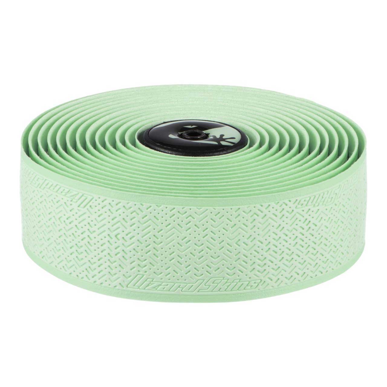 A roll of Lizard Skins DSP Bar Tape V2 - 1.8 MM in light green, featuring a textured, shock-absorbing grip and black end cap—ideal for extra comfort on your cycling rides.